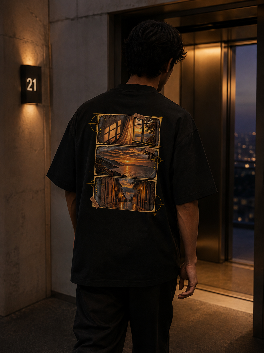 Person wearing the black EVAREN Out of Frame Tee from behind near an open elevator at dusk, showing the three-frame back artwork.