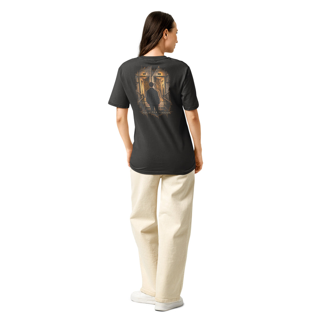 Woman wearing the EVAREN The Other Version Tee from the back, showing the large artwork and relaxed unisex fit.