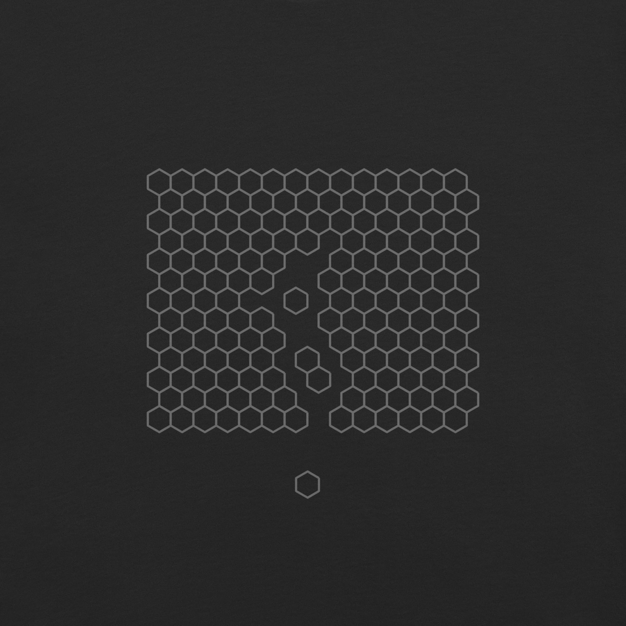 Close-up of the subtle geometric pathway graphic printed on the back of The Way Through Tee.