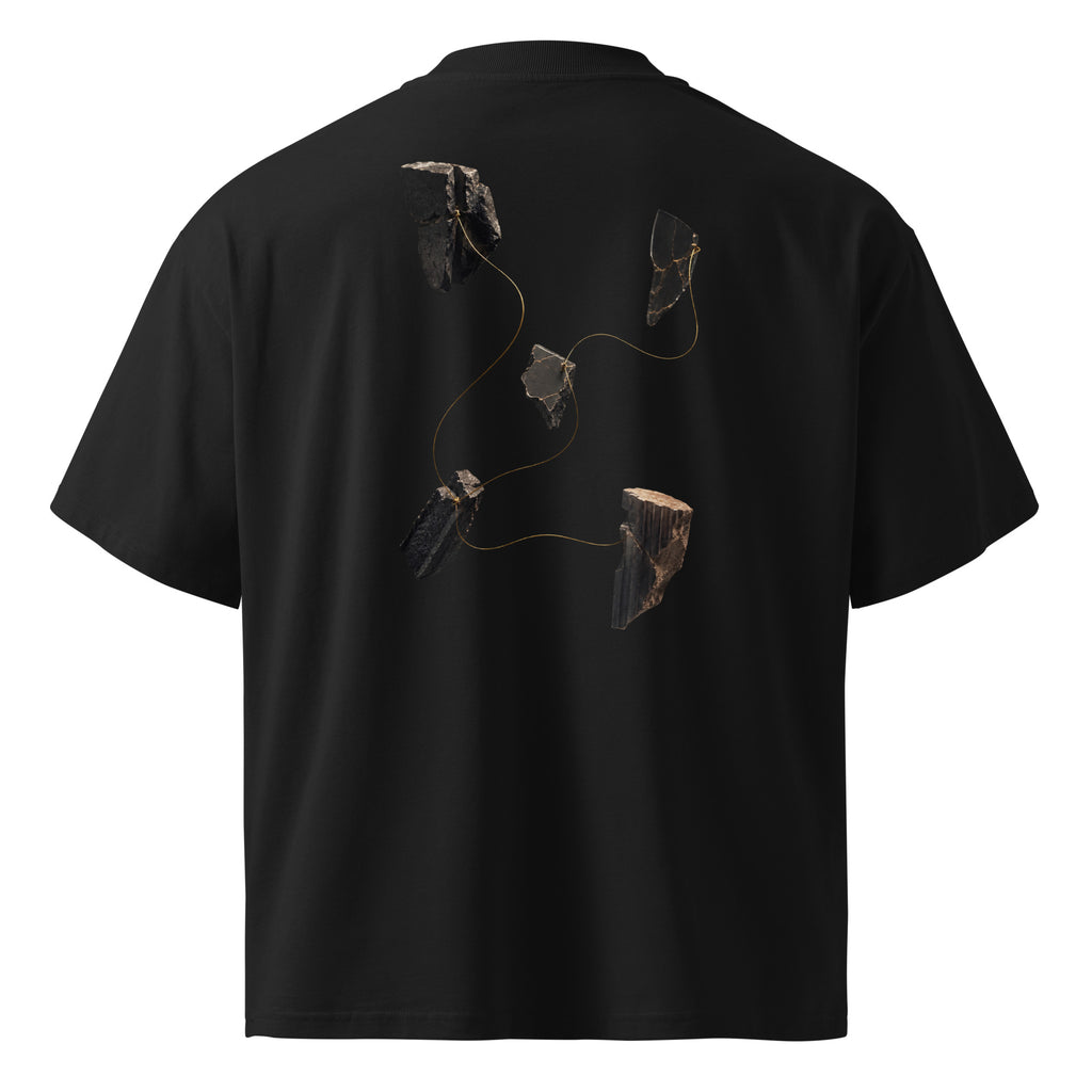 Back view of The Thread Remains Tee in black, showing five fractured forms connected by a fine gold thread.