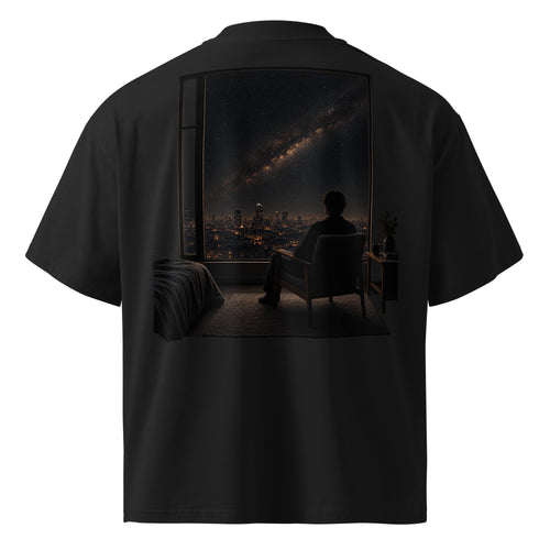 Back view of The Ordinary Sky Tee in black with the large nighttime city and window artwork.