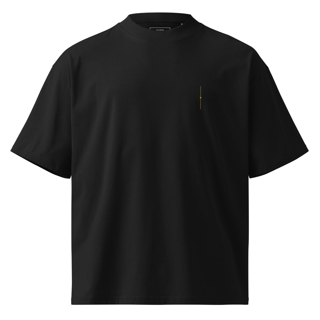 Front view of The Translation Tee in black with a minimal gold chest detail.