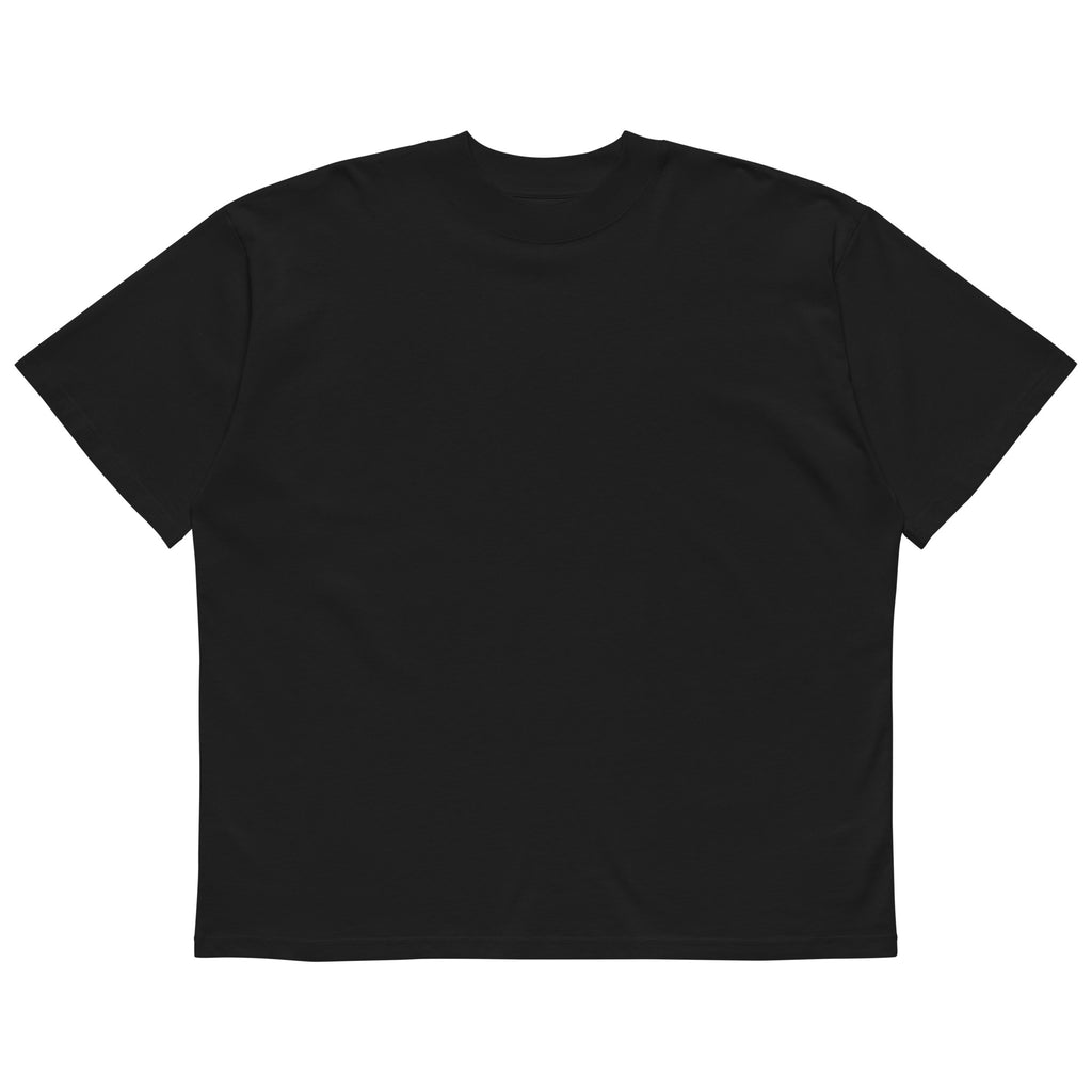 Front view of The Roads Tee in black, showing the clean blank front and oversized silhouette.