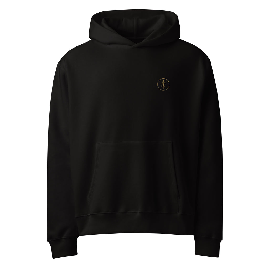 Front view of the black EVAREN Headed There Hoodie with a small gold circled evergreen on the left chest.