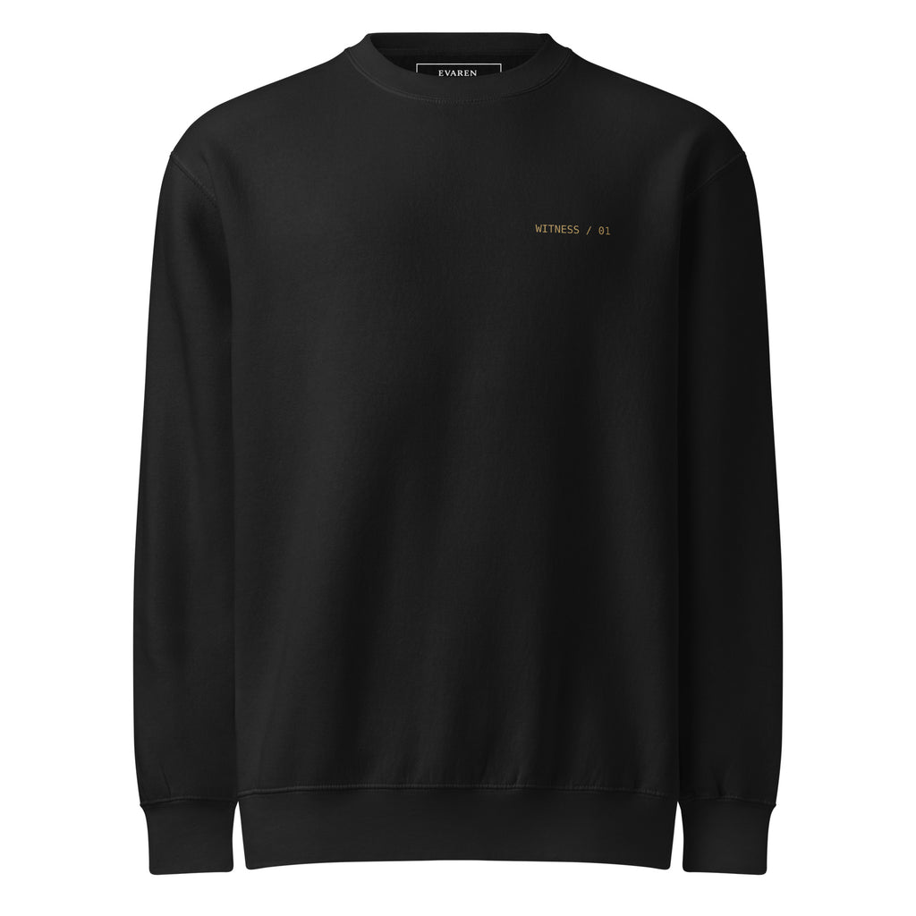 Front of The Witness Sweatshirt in black with a subtle WITNESS / 01 chest mark.