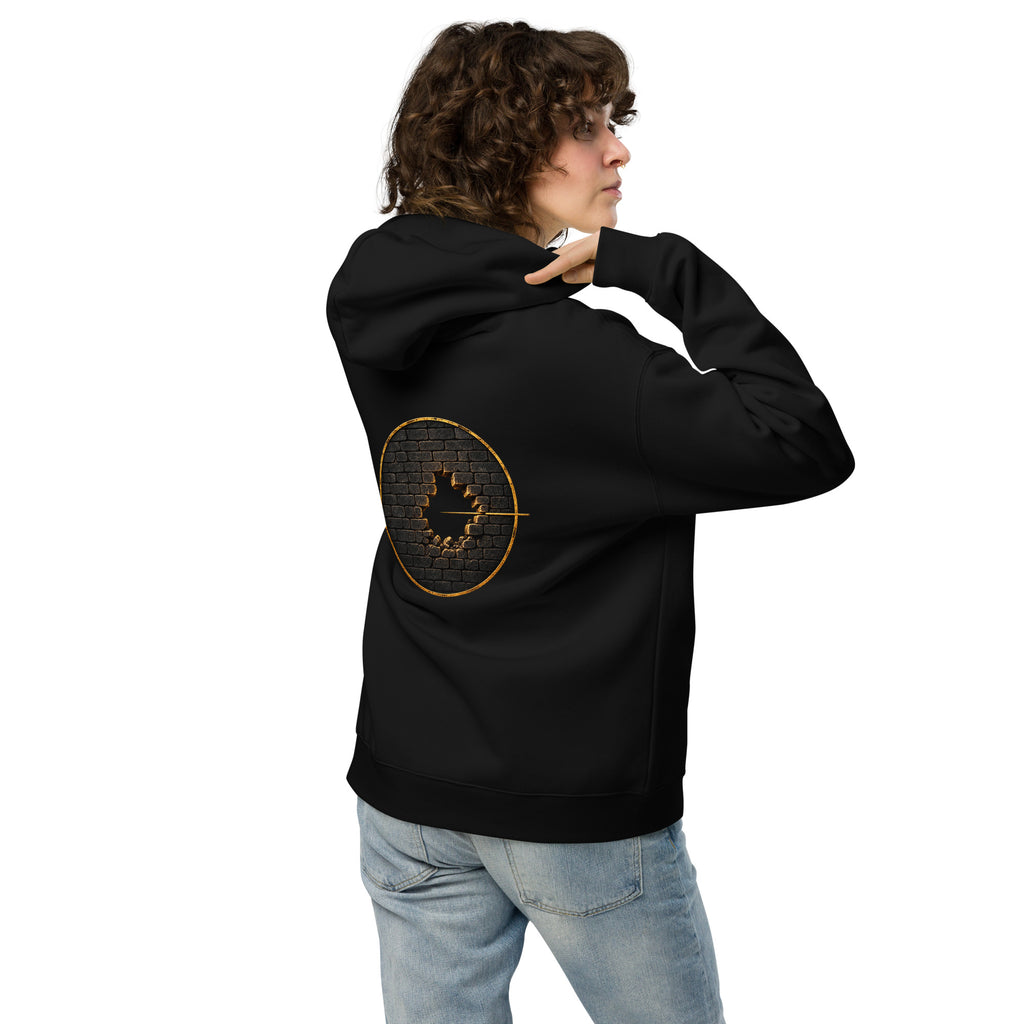 Model wearing The Break Hoodie from the back, showing the placement and scale of the circular gold broken-wall artwork.