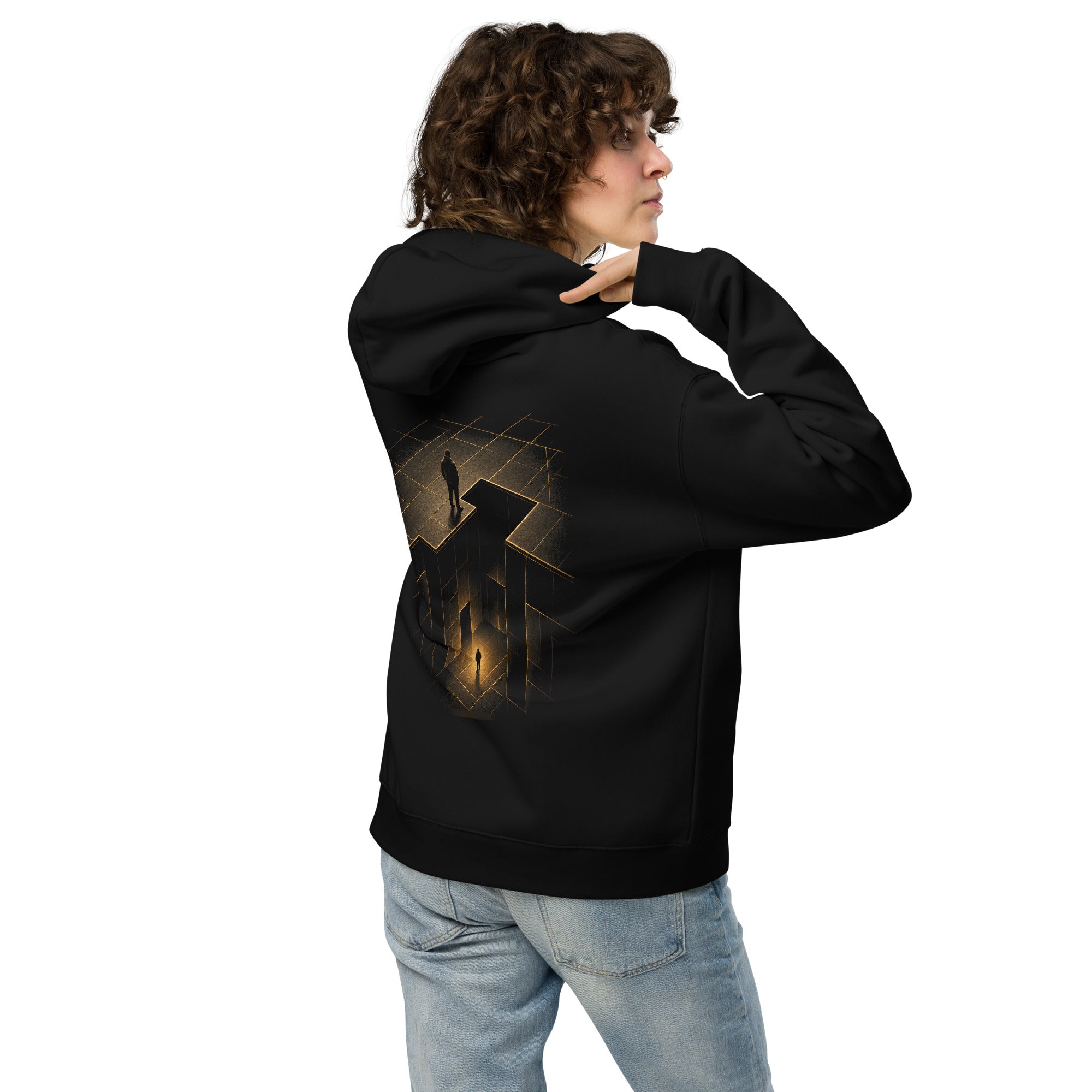 Person wearing The Trap Door Hoodie in black, showing the oversized fit and gold back artwork.